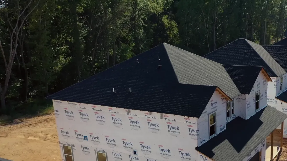 A new home in house wrap, seen from above